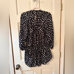 Rue+ black and white polka dot top with a gold zipper closure. Women’s size 3X